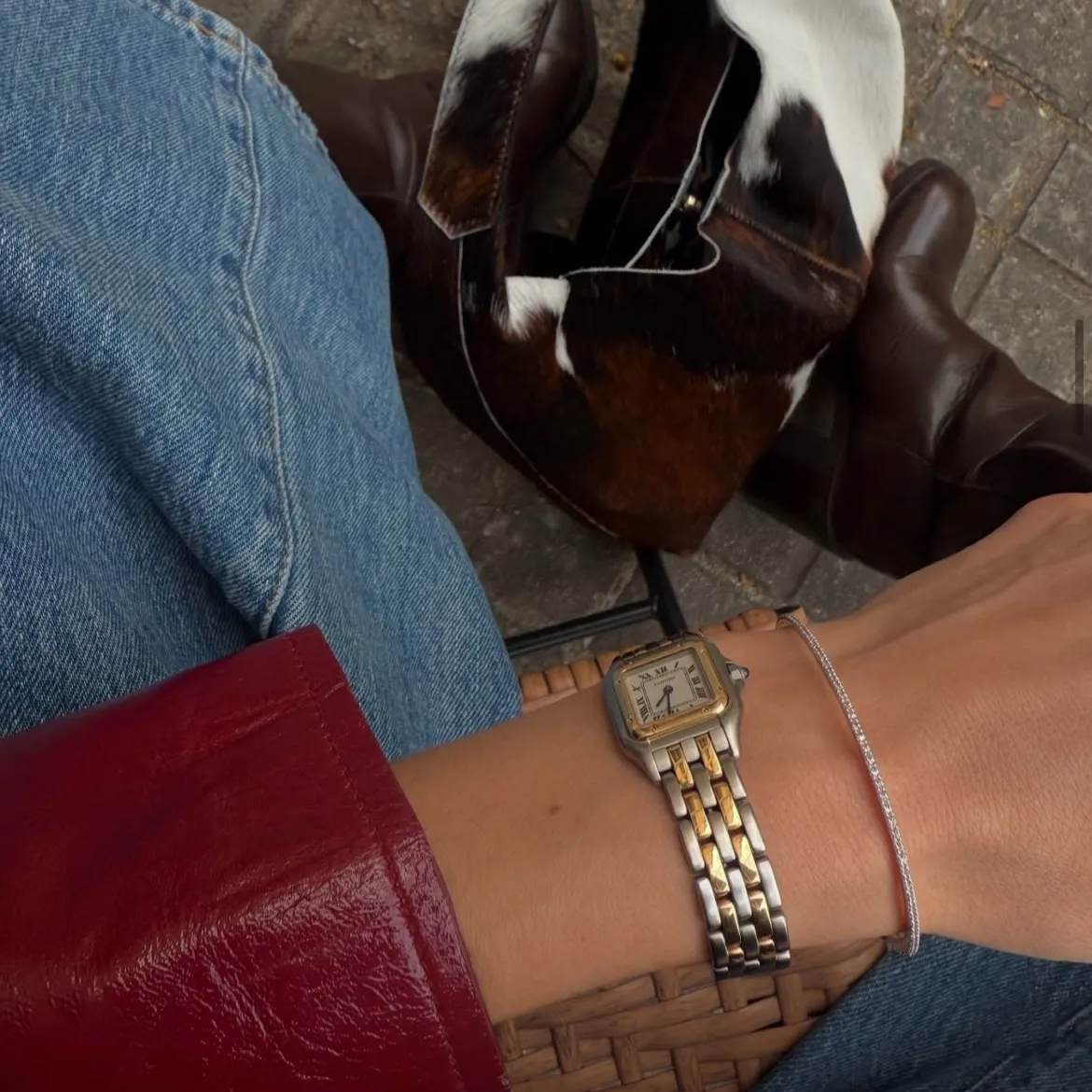 diamond tennis bracelet and watch on wrist