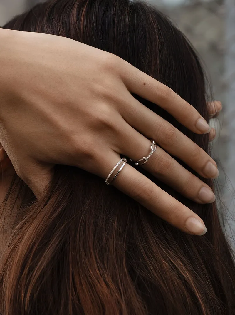 silver rings on hand 